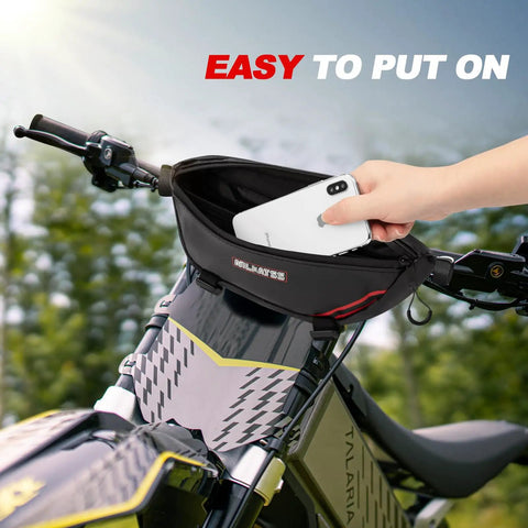 Waterproof Handlebar Tool Bag Made With PVC Tarpaulin For Dirt Bikes That Fits Sur Ron Segway Talaria Off Road Rides And Keeps Your Essentials Dry In Wet Weather Ready For Any Trail Or Wet Conditions on a dirt bike handlebar