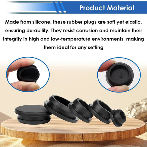 Close-up of black silicone rubber plugs from 65 Pcs Rubber Plugs For Round Holes Set In 6 Sizes displayed on wooden surface