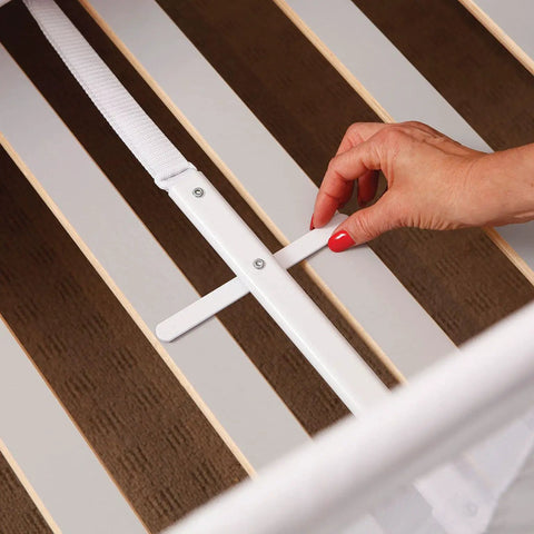 User securing Savoy Bed Rail Guard For Toddlers With Safety Anchors Fits Queen Size Mattress 43 Inches Wide By 18 Inches Tall