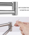 Hand using hex tool on Six Light Dimmable Track Lighting Kit With Flexible Foldable Arms In Satin Nickel Finish For Kitchen Hallway