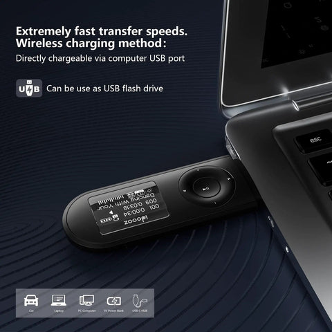 8GB USB MP3 Player With FM Radio Expandable To 32GB plugged into laptop USB port for direct charging