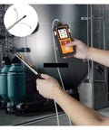 Person using All In One 4 In 1 Gas Leak Detector With Oxygen O2 Ex Hydrogen Sulfide H2S And Carbon Monoxide CO Portable Combustible Gas Monitor.