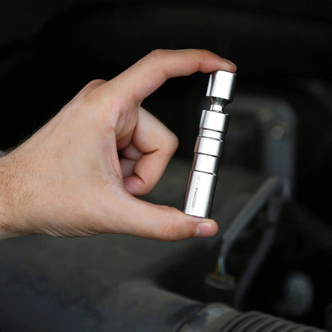 Three Eighths Inch Drive Swivel 14mm Spark Plug Socket With Flexible Head, Thin Wall Design, And Plug Retainer held by hand
