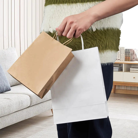 Person holding Dope Custom Printed Kraft Paper Bags With Logo For Small Business 150 Pack Medium 8x4.5x10.8 Inch Durable Brown Shopping Bags