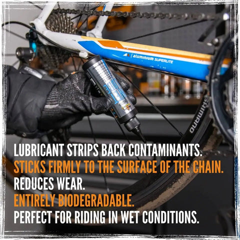 Applying BananaSlip Tungsten Wet Lube to a bicycle chain for a silky smooth ride, emphasizing ultra low friction and biodegradability.