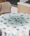 Large Round Lazy Susan With Solid 360 Smooth Spin Heavy Duty Tempered Glass Turntable Tray on a colorful tablecloth in a kitchen.
