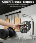 Cleaning the suction cup base of Compact USB Desk And Wall Mount Fan With Suction Cup Base And Digital LED Display Six Speeds