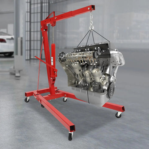 Heavy Duty Folding Hydraulic Engine Hoist Built Tough As Nails With Six Swivel Casters Telescopic Boom lifting an engine.