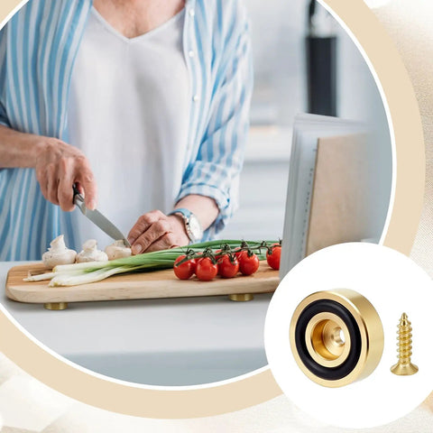 Woman chopping vegetables on a board with Solid Brass Cutting Board Feet With Grippy Silicone Pads keeping it stable.