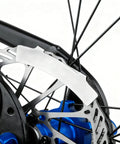 MTB And Road Bike Disc Brake Rotor Truing Tool Kit with stainless 4mm alignment wrench on a bike wheel rotor close-up