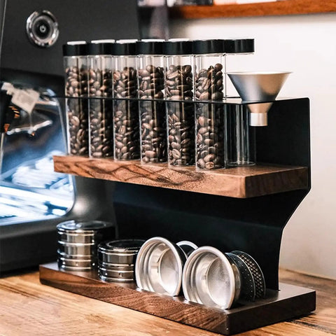 Two Tier Coffee Tool Storage Stand With Twelve Single Dose Bean Vials And One Way Exhaust Valve Plus Heavy Duty Slots For Tamper And Dosing Cups, walnut and glass design.