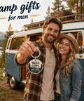 Couple holding Camper Keychain For RV Lovers And Road Trip Fans, Happy Camper Keyring by vintage van in outdoor setting.