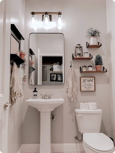 4 Light Farmhouse Vanity Light With Funnel Glass Shades In Smoked Birch Finish in bathroom above mirror
