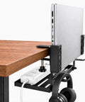 Adjustable Under Desk Laptop Holder With Integrated Cord Organizer Rack Quick Grip Edge Clamp for holding laptop and power strip.