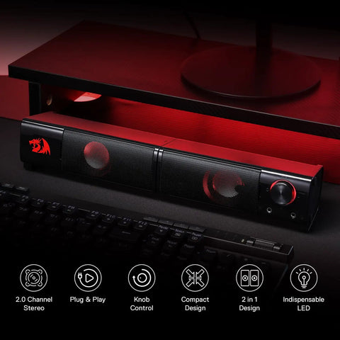 GS550 2.0 Channel Desktop PC Gaming Speakers Bar with USB power, red backlit, under a monitor, showing volume knob and logo