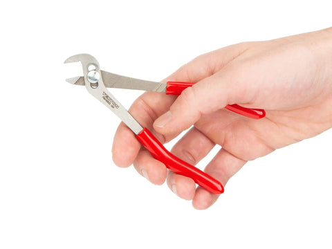 Hand holding Five Inch Angle Nose Slip Joint Pliers with Half Inch Jaw, Three Position Adjustments, red slim non-slip grips.