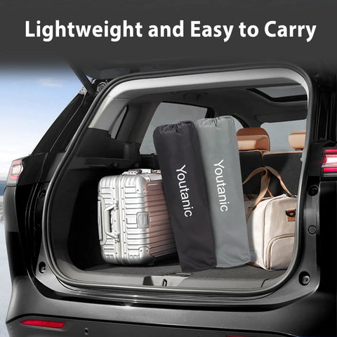 Car trunk packed with camping gear and travel suitcases, showcasing the portability of the Beefy Heavy Duty Oversized Camping Chair With Side Pocket And Cup Holder Portable Folding Outdoor Chair For Adults Up To 400 Lbs Perfect For Fishing Sports Camping And Weekend Trips.