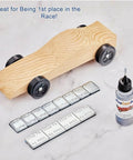Two Size Pinewood Derby Weights Kit With Twelve Piece Weight Set Including Four Half Ounce And Eight Quarter Ounce Weights And Half Ounce Graphite Lubricant Powder For Derby Wheels And Axles To Boost Car Speed, showing weights, car, graphite bottle.