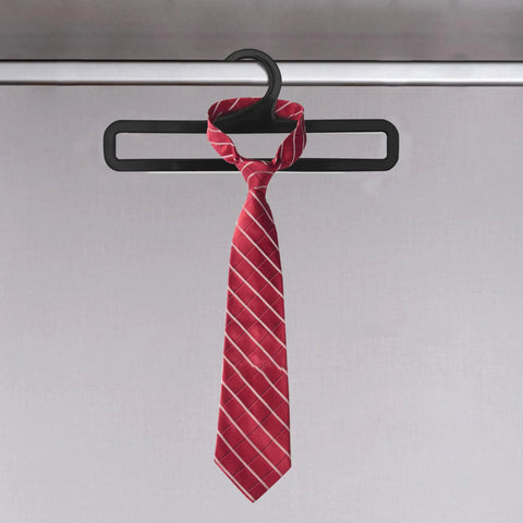 Set Of 50 Black Plastic Hangers For Home And Retail Display, 7.7 Inch Long, shown holding a red tie