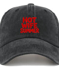 Effortlessly Cool Lightweight Summer Cotton Dad Hat For Women With Adjustable Strap, front view, black with red "HOT WIFE SUMMER" text.