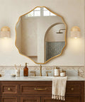IPEDWO Yellow Travertine Wall Sconce with Natural Wood,4.7" Single Sconce mounted beside a mirror in a stylish bathroom.
