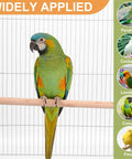 Premium Natural Wood Bird Perch Stand Set For Parakeets And Cockatiels, Five Piece Assorted Rods For A Smooth Multi Level Cage Setup That Really Slaps with a green parrot on a wooden perch.
