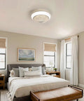 15 Inch Enclosed Bladeless Ceiling Fan with RGB Dimmable LED Light, 6 Speed Reversible Quiet Flush Mount Fan with Remote Control in modern bedroom.