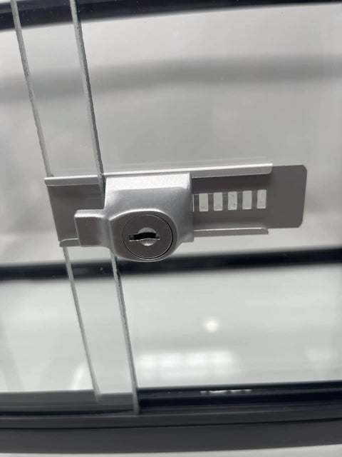 Close-up of Stick On Showcase Lock With Keyless Entry And Quick Touch Control Strong Secure Latch Modern Sleek Look on glass door