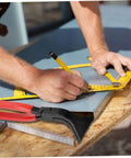 45 Degree Sheet Metal Bender Hand Seamer with non-slip grip shown with metal sheet on workbench