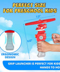 Child's hand holding Outdoor Flying Disc Launcher Toy for Kids Ages 3 4 5 6 7 8 Boys and Girls, ergonomic pull string design
