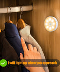3 Pack Motion Sensor LED Night Lights With USB Rechargeable Battery, 8 LEDs, installed in closet, illuminating clothes, warm white