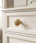 Front view of Champagne Bronze Cabinet Knobs Ten Pack Vintage Round Floral Hardware One Point Four Inch Classic Kitchen Cabinet Handles installed on drawer