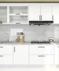 Modern kitchen with white cabinets featuring 3 pack black cabinet pulls 3.75 inch hole center wide foot drawer pulls for cabinets.