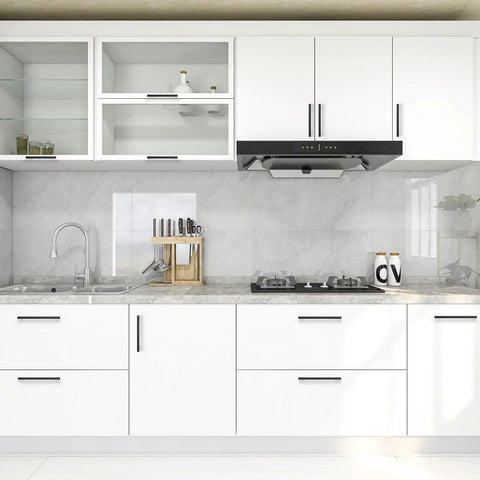Modern kitchen with white cabinets featuring 3 pack black cabinet pulls 3.75 inch hole center wide foot drawer pulls for cabinets.