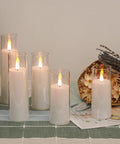 Set Of 5 Battery Operated Flameless LED Pillar Candles With Acrylic Shell, Remote Control And Timer, 3D Wick on table