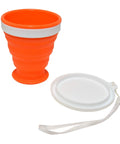 Orange collapsible cup from 4 Piece Camp Kit Multi Tool Set With Spoon And Fork, 5 Oz Stainless Steel Flask, Collapsible Cup, Corkscrew