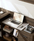 Cool L Shaped Electric Standing Desk In Dark Walnut With Smart Hutch And Built In Storage For Home Office, laptop and accessories on desktop.