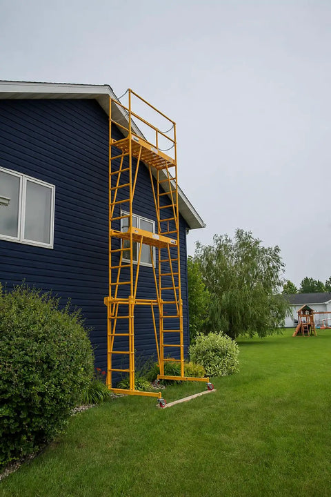 Heavy Duty Adjustable Work Platform Featuring Locked Safety Rails Acts As A Slick Scaffolding Alternative That Rolls Straight Through Standard Doorways For Tight Indoor Or Outdoor Projects Up To Eleven Feet High