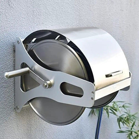 Premium Rock Solid Stainless Steel Garden Hose Reel Featuring Wall Mount Flexibility And Included Twenty Five Meter Hose showcased on a wall.