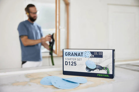 Granat D125 GR set sanding discs box with VOC varnishes and hard substrates clog resistant coating on table