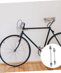 Black bike with insert showing Beefy Solid Shaft Rear Hub Axle Tool For Bikes Beefed Up Iron Axle Durable Metal Construction Precision Machining.