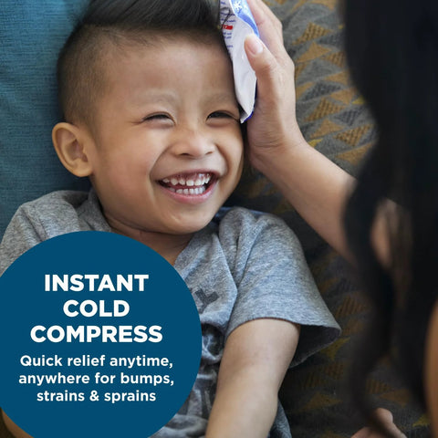 Instant cold compress front view being applied to a child's head, blue packaging visible.