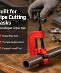 Versatile Pipe Cutter For One Eighth To Two Inch Tubing, Portable Tube Cutting Tool For Plumbing And DIY Projects, Handy, Compact, Lightweight And Easy To Use, Delivers Clean Cuts. Red pipe cutter on steel tubing on workbench