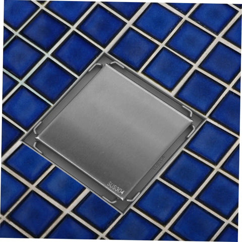 Heavy Duty Stainless Steel Shower Floor Drain Filter Top Shelf Hair Catcher Strainer on blue tiled bathroom floor.