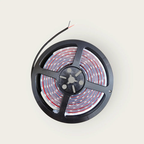 8 Foot IP68 White Marine LED Strip Lights Submersible For Boats And Yachts, coiled on a black reel.