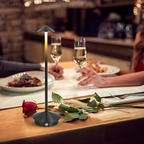 Cordless Table Lamp With 6000mAh Battery, Portable LED Desk Light on a dining table with a rose, modern triangle design