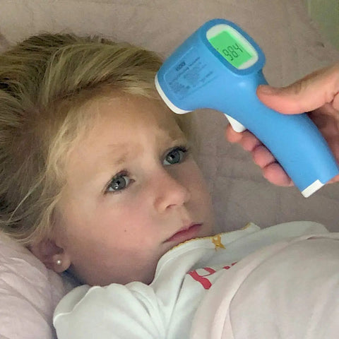 Non Contact Infrared Thermometer For Forehead Food And Bath Use Fast Accurate Readings For Adults Kids And Babies Hygienic Touchless Digital Thermometer Now, blue handheld unit measuring a child's forehead