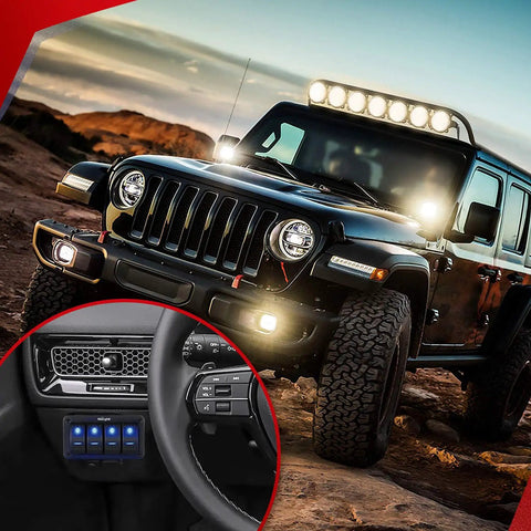 Off-road vehicle with 12V LED Light Bar Wiring Harness Kit with 4 gang switch, illuminated at dusk on rocky terrain