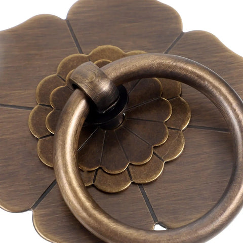 Close-up of Vintage Metal Cabinet Pulls With Lotus Ring Handles Antique Bronze Drawer Knobs For Kitchen And Dresser Furniture