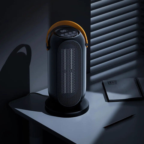 Portable Electric Heater For Indoor Use With Three Heat Modes And Thermostat, sleek black compact design on office desk